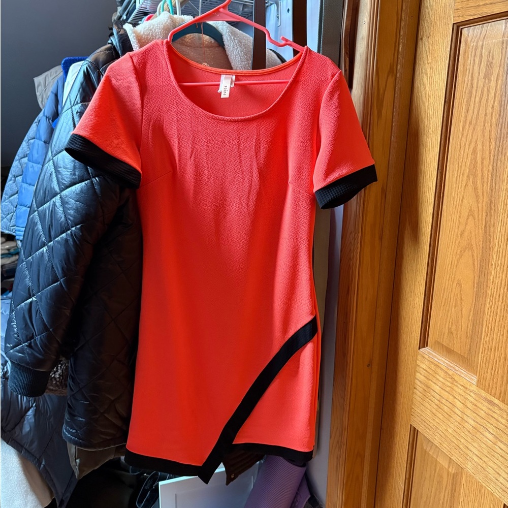 coral pink mini dress with black accents